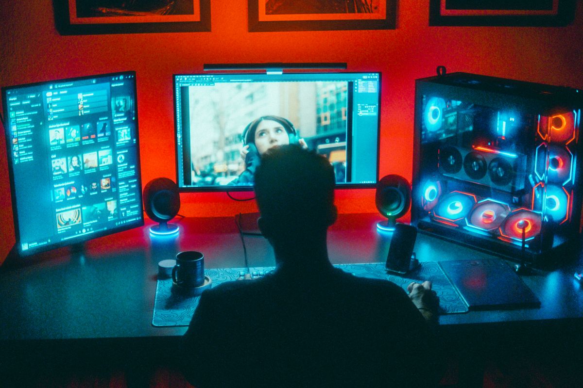 A monitor with soft LED light glowing behind it